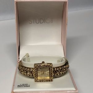 Watch by: Studio Time. Bracelet band with crystals